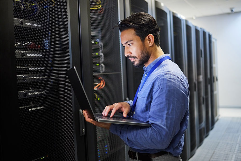 A systems engineer managing servers in a data center